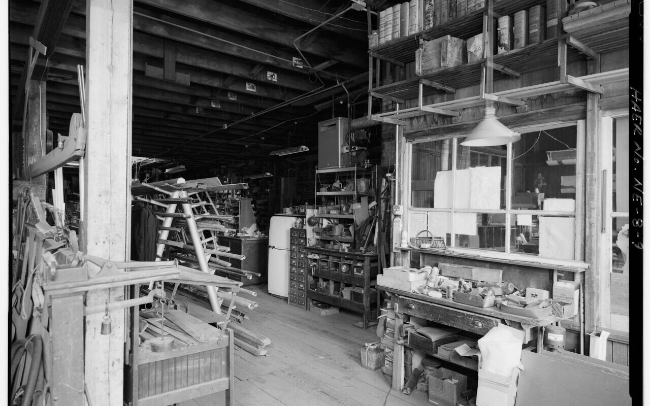 Northeast from south entrance across receiving area of factory past the glass
