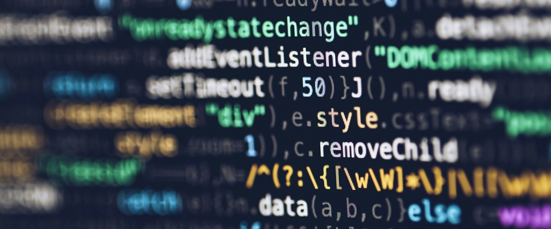 JavaScript source code on a dark screen, with function calls, event listeners and DOM methods picked out in colour.